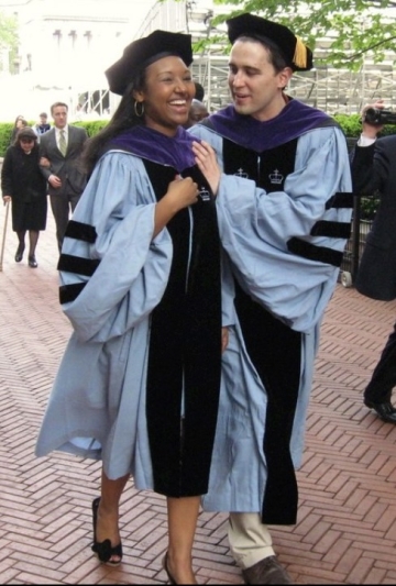 Zac and Samantha Soto in blue gowns at their Columbia Law graduation